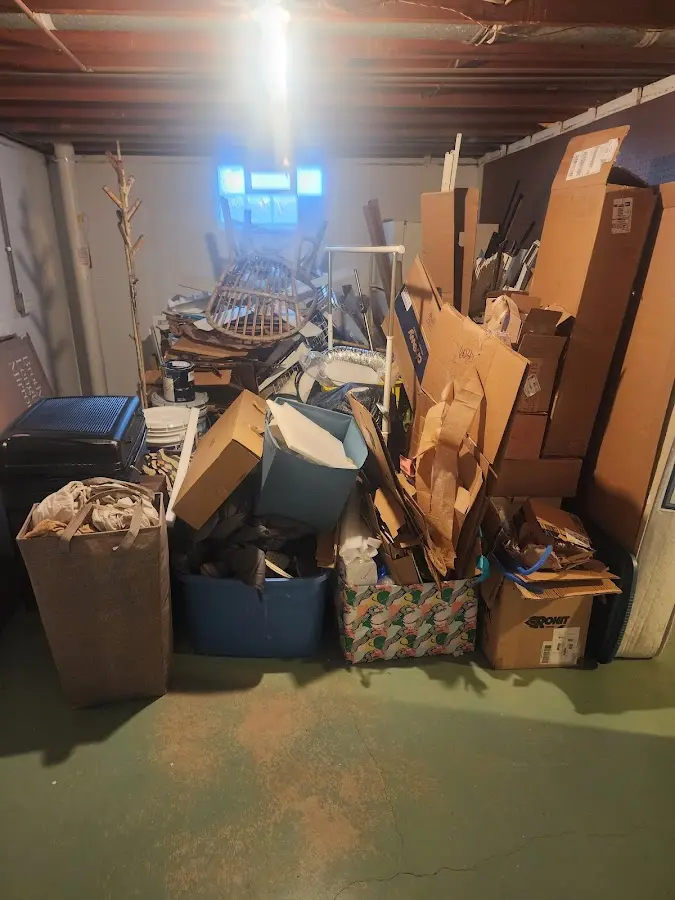 Roll-off dumpster container at job site for 2 Yard Dumpster Rental in Minooka